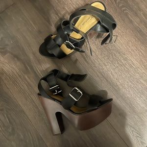 Black strapped wooden platform heels